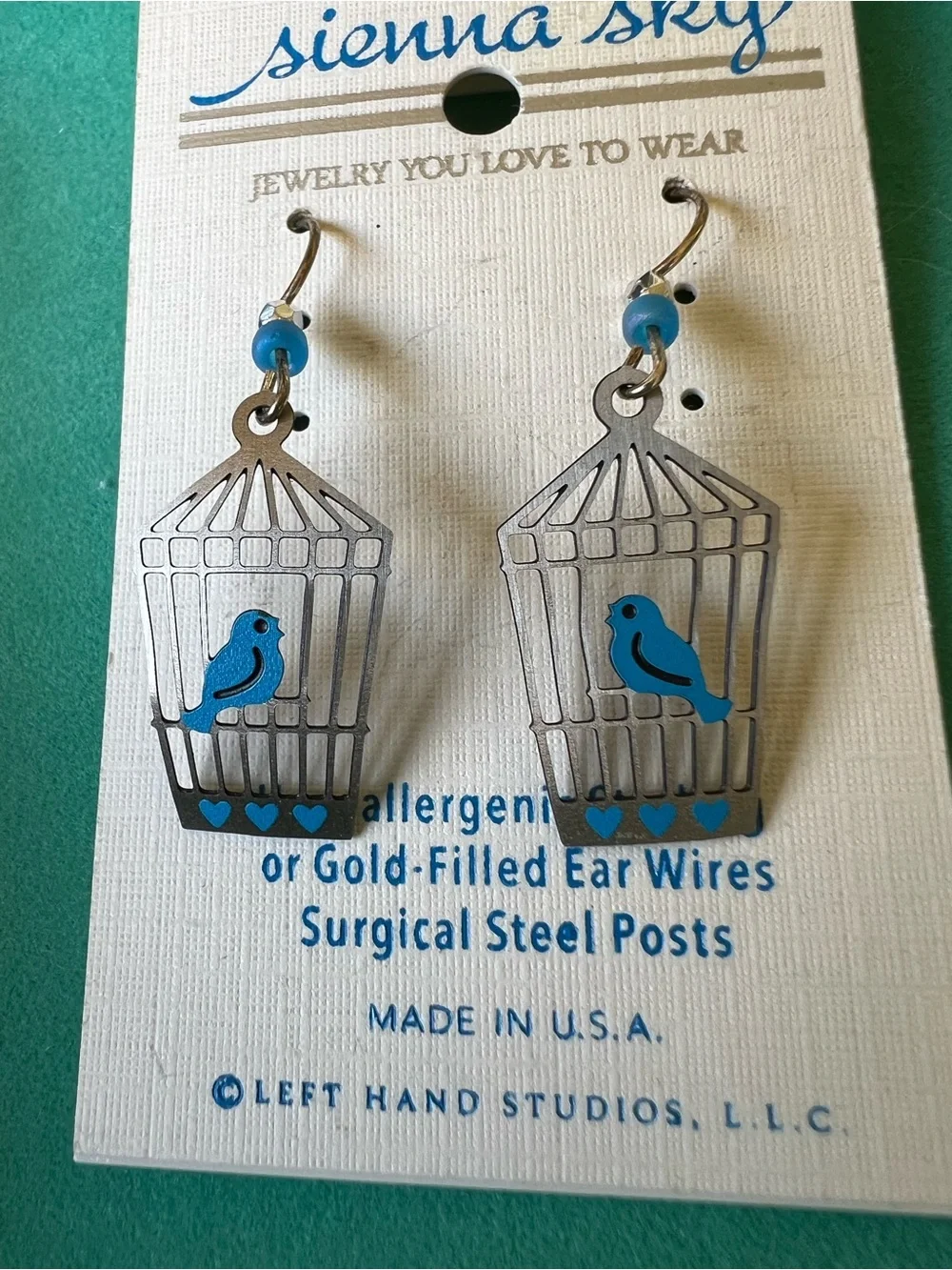 Sienna Sky Silver Birdcage Earrings with Bright Blue Birds